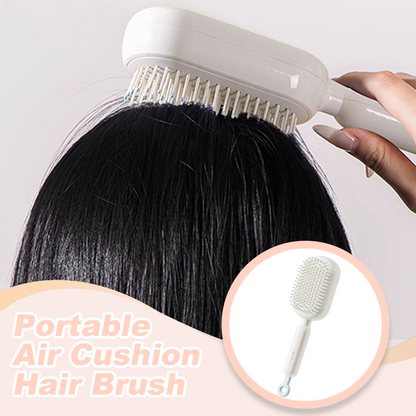 Cepillo de pelo portátil con almohadilla de aire
